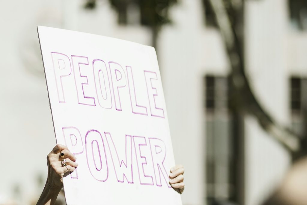 People power placard at a black lives matter protest